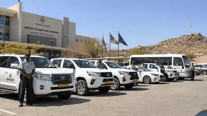 Namibian government fleet vehicles parked outside the Ministry of Works and Transport